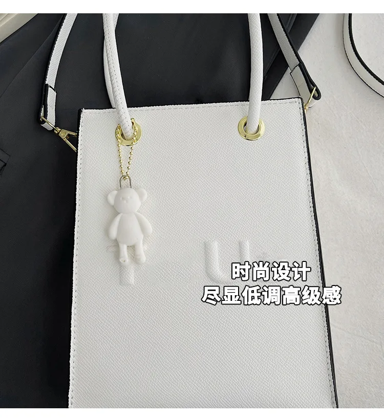 105440-nlqexr.jpg Bolso cuadrado pequeño para mujer, bolso nuevo a la moda, bandolera informal, bolso para teléfono móvil de Color sólido 2024