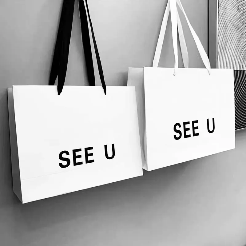 Bolsa de embalaje de compras de cartón blanco con asa de cinta de lujo personalizada, bolsas de papel impresas personalizadas con su propio logotipo, 10 Uds.