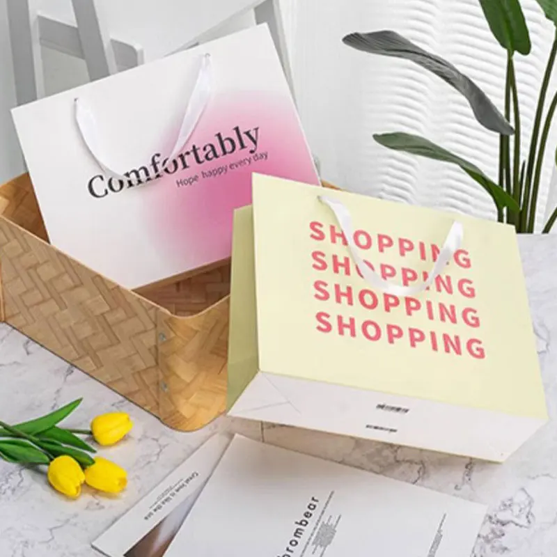Bolsa de embalaje de compras de cartón blanco con asa de cinta de lujo personalizada, bolsas de papel impresas personalizadas con su propio logotipo, 10 Uds.